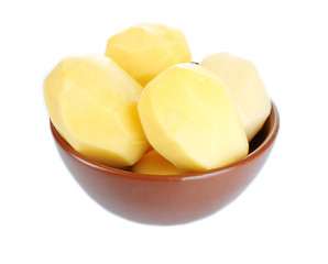 Raw peeled potatoes in bowl isolated on white