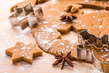 Making Christmas gingerbread cookies. Shallow depth of field.