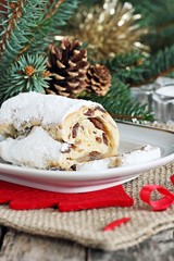 Stollen.Traditional German Christmas cake on a wooden table