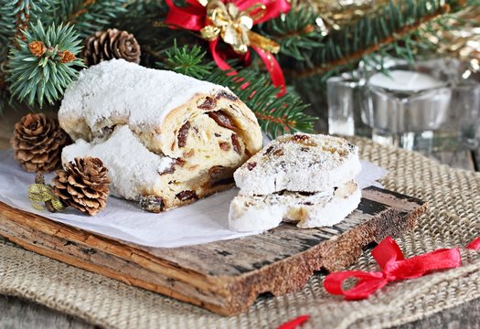 Stollen.Traditional German Christmas cake on a wooden table