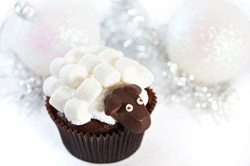 Cake and Christmas balls with marshmallow