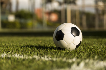 Fototapeta na wymiar Soccer ball on a grass field.