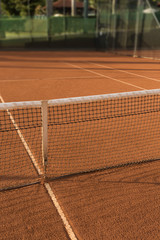 Clay (Dirt) Tennis Court.