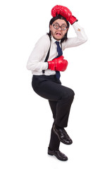 Funny young  businessman with boxing gloves isolated on white