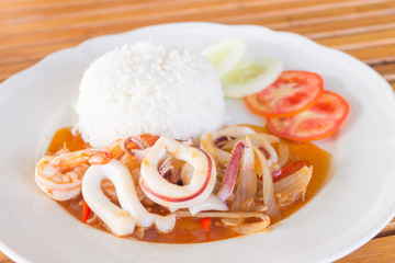 squid and prawns fried with chilies , Thai food