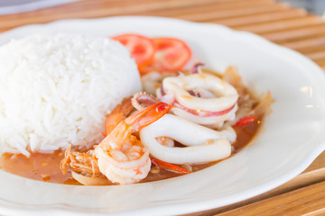 squid and prawns fried with chilies , Thai food