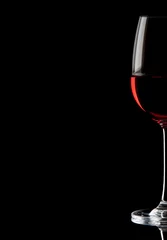 Tuinposter Red wine in a glass © Valeriy Lebedev