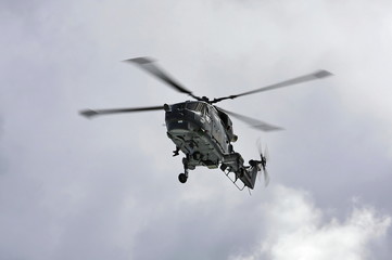 Fototapeta premium Naval helicopter on training mission