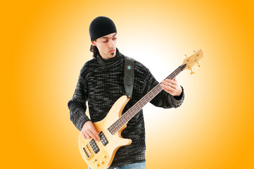 Obraz premium Guitar player isolated on the white background