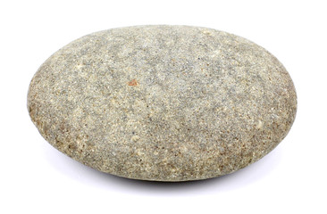 Fototapeta na wymiar The round stone is isolated on a white background