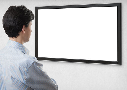 Businessman Staring At Tv With Blank Screen