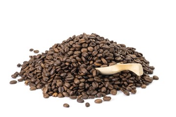 Pile of coffee beans with a wooden spoon on white background