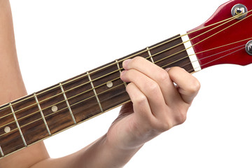 Photo of woman's fingers on guitar