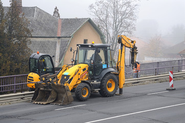 Industrial machines working in road construction