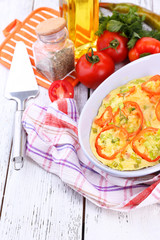 Casserole with vegetables in bowl  on table close-up