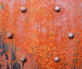 Rusty girder with bolts from old railroad bridge.