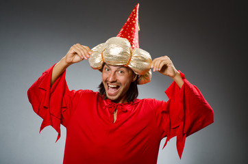 Funny wizard wearing red dress
