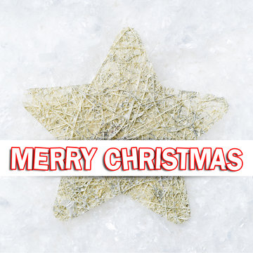 Stern im Schnee mit Merry Christmas Textbotschaft