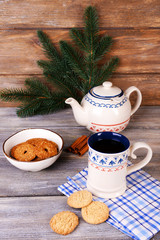 Cup of tea on table on wooden background