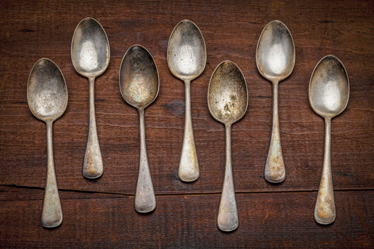 silver spoons with patina