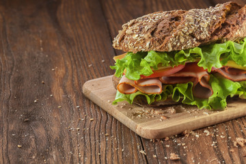Sandwich on the wooden table
