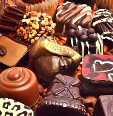 assortment of chocolate sweets and coffee grains