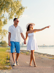 smiling couple walking outdoors