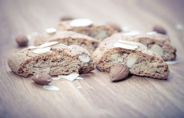 Cantuccini on wooden background, typical tuscan biscuits