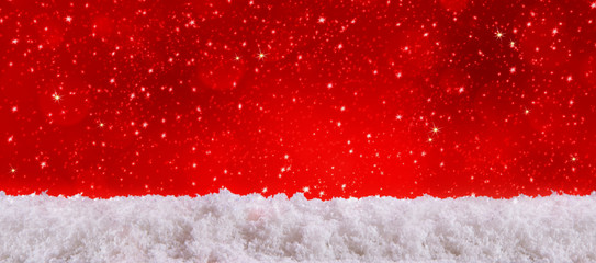 Red christmas background and white snow. 