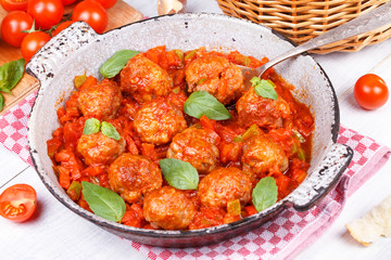 Meatballs with tomato sauce in a pan