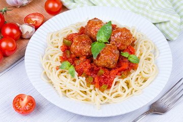 Spaghetti with meatballs in tomato sauce
