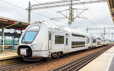 Fototapeta na wymiar Modern double-decker train in Sodertalje syd station - Sweden