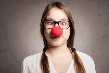 Deurstickers happy young girl with a clown nose © xavier gallego morel