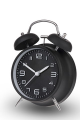 Black alarm clock with the hands at 10 and 2