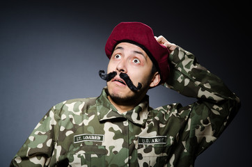 Funny soldier in military concept