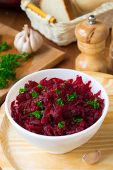 Traditional Russian salad with grated beetroot