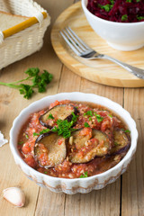 Roasted eggplant pieces with spicy raw tomato dip