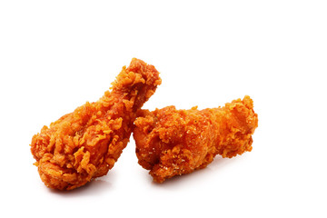 Hot and spicy fried chicken on white.