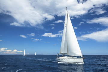 Sailing. Boat in sailing regatta. Luxury yachts.