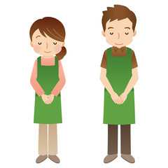 エプロンをつけたスタッフ