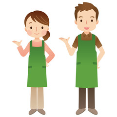 エプロンをつけたスタッフ