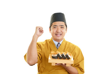 ガッツポーズの寿司職人