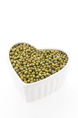 Green mung beans isolated on white background