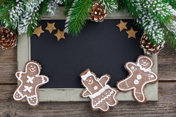 Christmas concept. Black board for text and gingerbread man