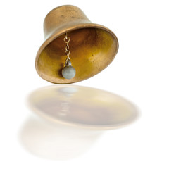 Fototapeta na wymiar Bronze bell with reflection