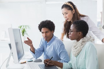 Creative team working at desk