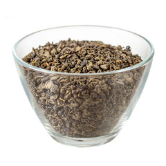 Loose green gunpowder tea in glass bowl
