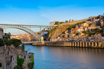 Fototapeta na wymiar Bridge through River Douro in city of Porto, Portugal