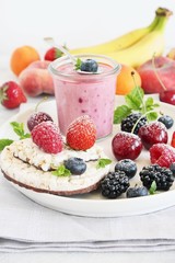 Healthy breakfast with dietary rice waffles, yogurt and berries.
