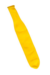 Yellow deflated balloon over white
